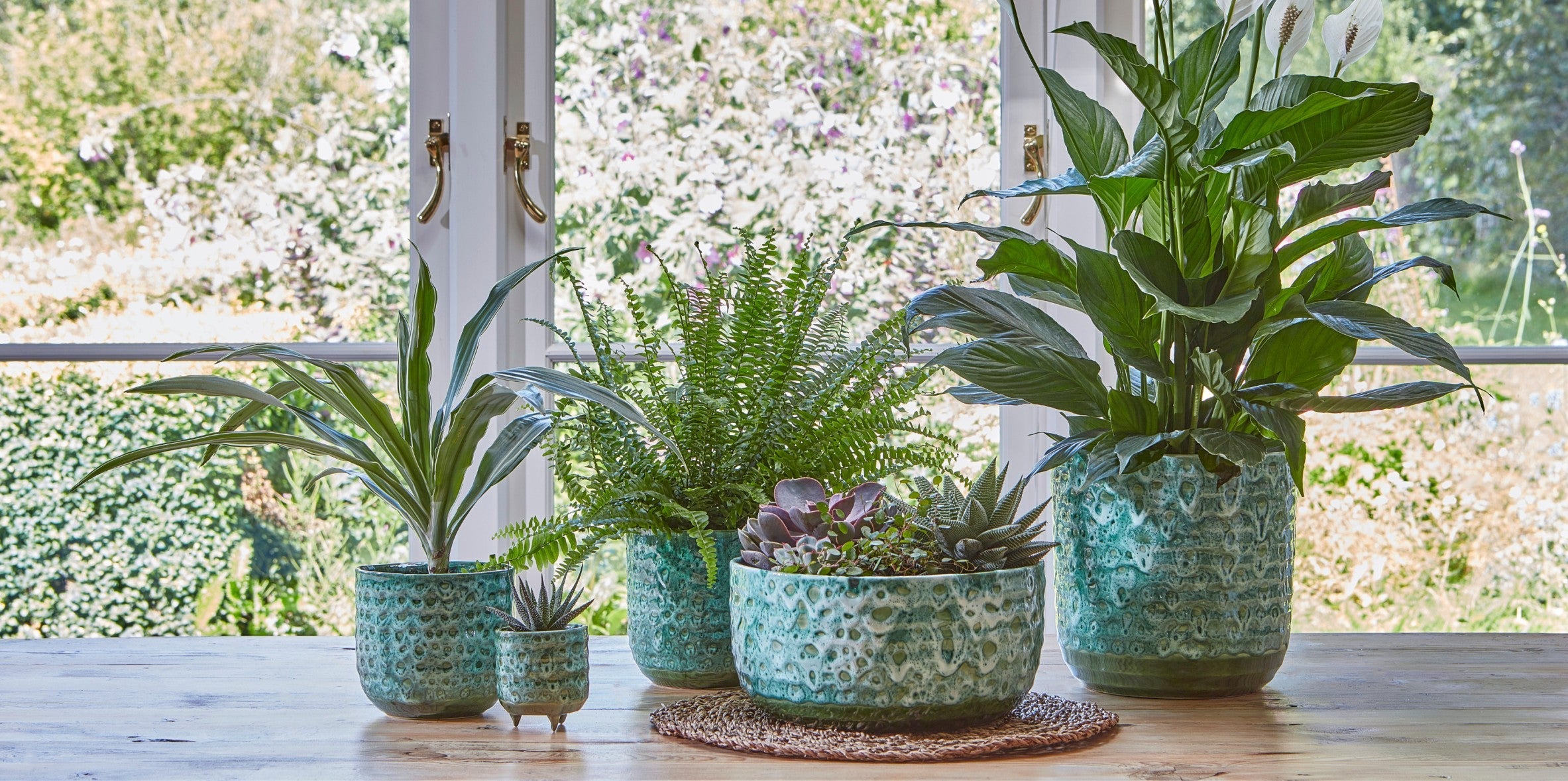 Ivyline's Reactive Glaze Planters and Bowls in emerald