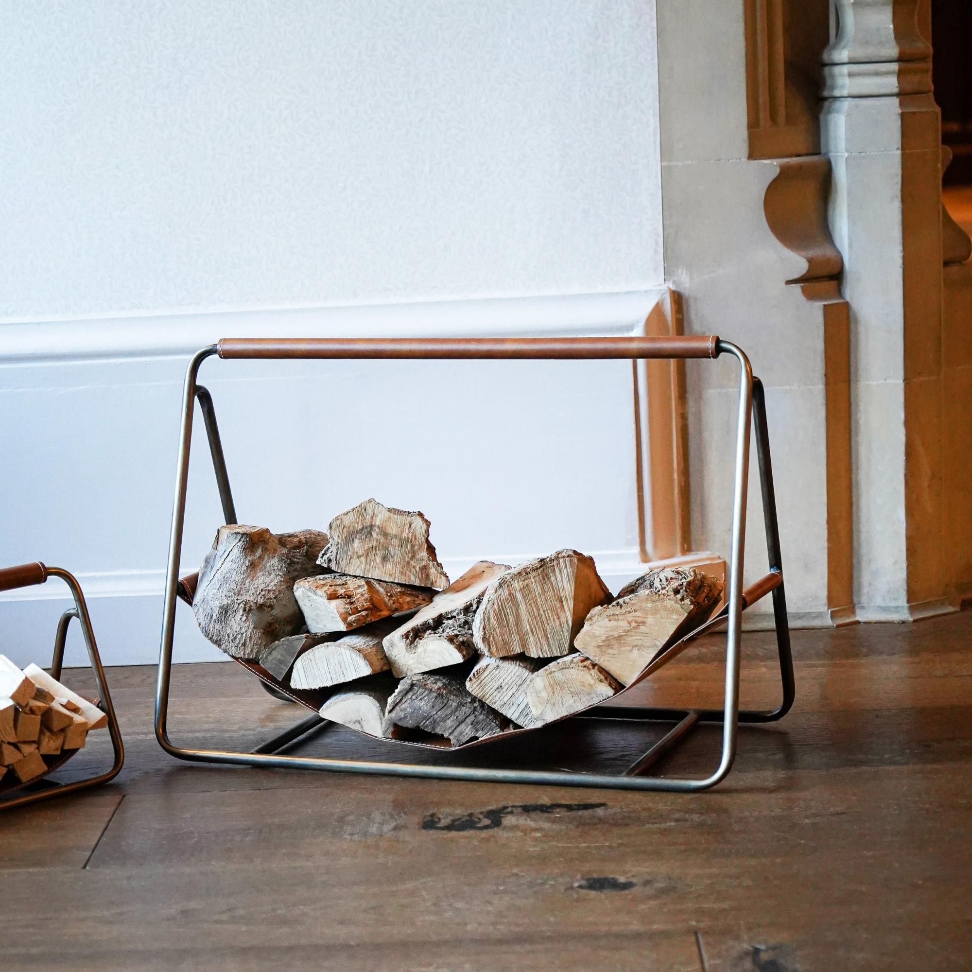 Brown vinyl sling and bent wire ball feet magazine rack buy firewood log holder Jacques Adnet style firewood log holder